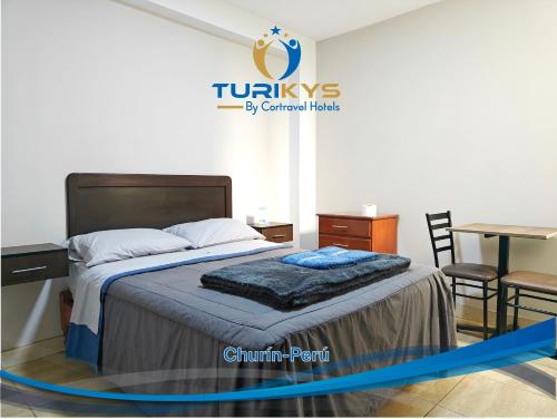 Hotel Turikys Churin 객실 침대