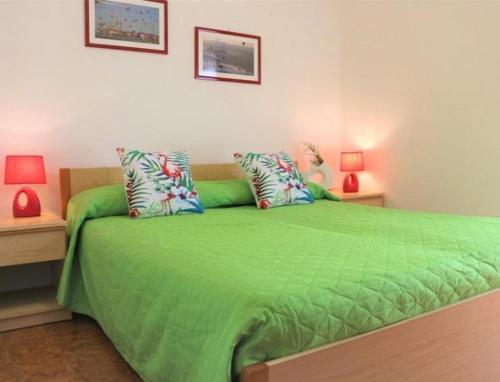 A bed or beds in a room at Beautiful Apartment with Sea View - Including Beach Place by Beahost Rentals