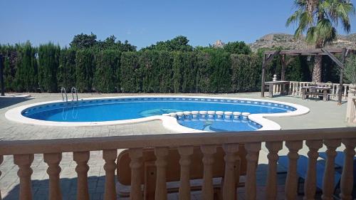 Piscina a CASA RURAL EN LA HUERTA DE MULA o a prop