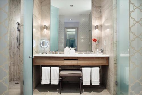 a bathroom with a sink and a mirror at The St. Regis Mexico City in Mexico City