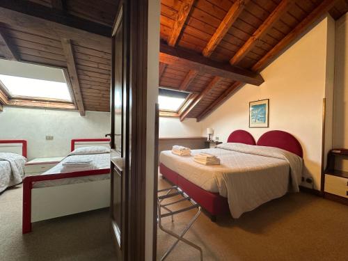 Cama o camas de una habitación en Hotel Alpi - Foza