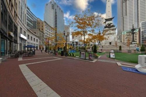 a street in a city with tall buildings at Downtown Indy Lucas Oil Conv Center Skywalk#5 in Indianapolis