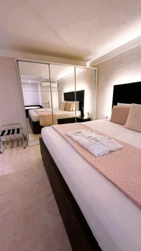 Ένα ή περισσότερα κρεβάτια σε δωμάτιο στο Hotel Rancho Verde