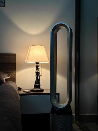 Ένα ή περισσότερα κρεβάτια σε δωμάτιο στο Modern Calmette Home - Central HCMC Comfort & Convenience