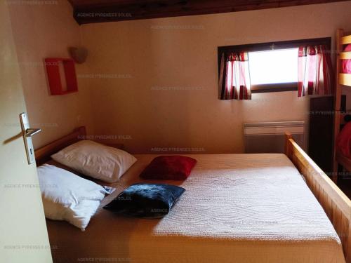 מיטה או מיטות בחדר ב-Appartement Formiguères, 3 pièces, 6 personnes - FR-1-295-199