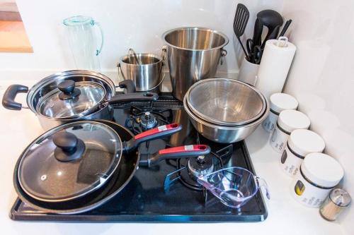 Una cocina o cocineta en 沖縄を北から南まで楽しみたい方にピッタリ！近場にはエメラルドグリーンに輝くビーチもあります