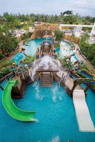 an image of a water park with a water slide at Modern Comfy Suite Room-9Pax in Perai