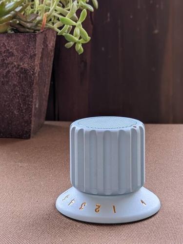 a white object sitting on a table with a plant at プライベートサウナがあるGuestHouseレビッキ【水上駅】より徒歩10分【水上IC】より車7分 in Minakami