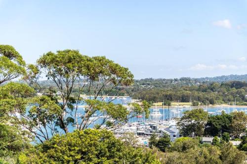 a view of a harbor with boats in the water at Newly renovated 4 bedroom home in Newport with Pittwater views in Newport