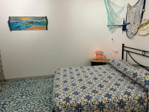 Voodi või voodid majutusasutuse Angolo di Paradiso Perla Turchino toas