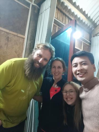 a group of people posing for a picture at Moc's House bắc hà in Bắc Hà