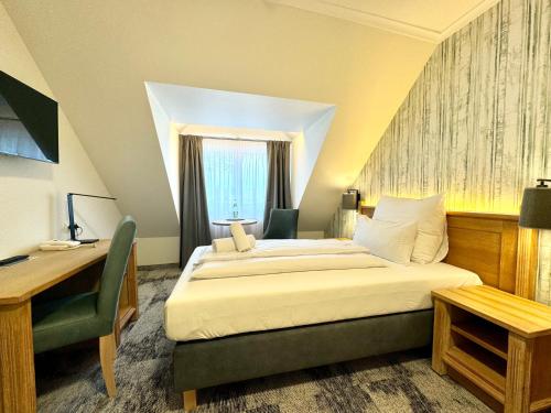 Postel nebo postele na pokoji v ubytování Hotel Residenz WALDOASE