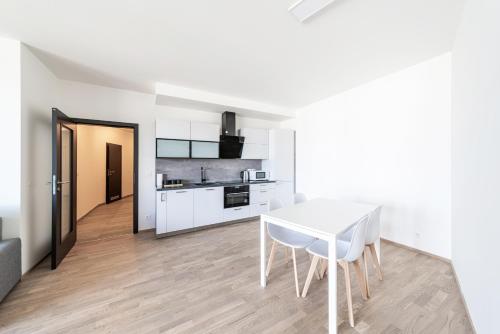 Кухня или мини-кухня в Residence Port Karolina
