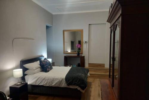 Postel nebo postele na pokoji v ubytování Apartment in Stellenbosch