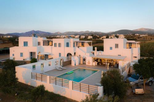 an aerial view of a house with a swimming pool at Naxos Affinity Villas in Maragkas