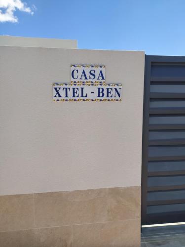 a sign on the side of a building at Casa XtelBen in Daya Nueva
