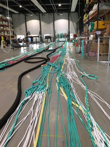 a bunch of ropes on the floor of a warehouse at Nyd den skønne natur ved hav og fjord in Thyborøn