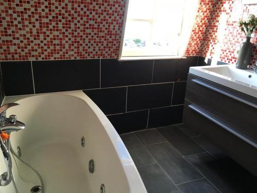 Koupelna v ubytování B&B De Kaai