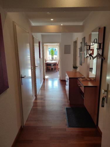 a hallway of a home with a kitchen and a dining room at Ferienwohnung Schmidt in Bayerisch Eisenstein