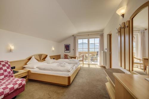Postel nebo postele na pokoji v ubytování Ruster Resort