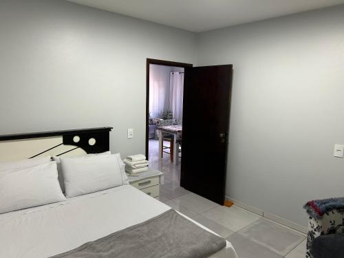 Un pat sau paturi într-o cameră la Casa das Suculentas
