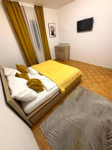 Cama ou camas em um quarto em K.O Family Apartment