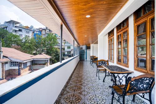 Μπαλκόνι ή βεράντα στο Sparrow Cherry Resort 2 min walk To MG Marg