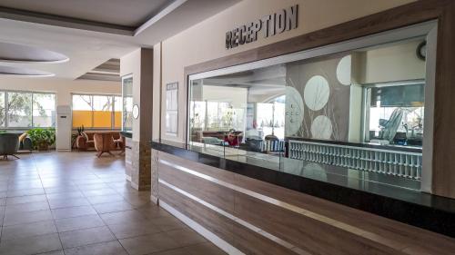 a store lobby with a large display window at Catty Cats Garden Hotel in Side
