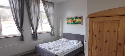 Postel nebo postele na pokoji v ubytování Skeppsgården B&B