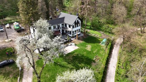 an aerial view of a house in the woods at Starite Borove in Sinagovtsi