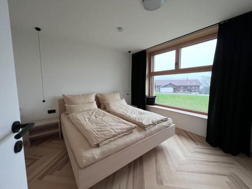 Postel nebo postele na pokoji v ubytování Luxusappartement hôamele - Ferienwohnung mit Genuss