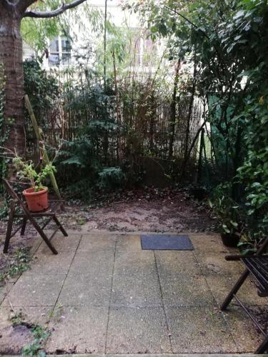 Photo de la galerie de l'établissement Appartment with garden - Chaville, à Chaville