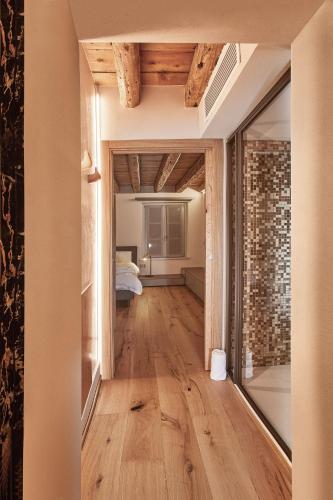 PALMANOVA SUITE HOMEにあるベッド