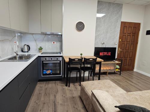 Η κουζίνα ή μικρή κουζίνα στο Sky Apartaments city center
