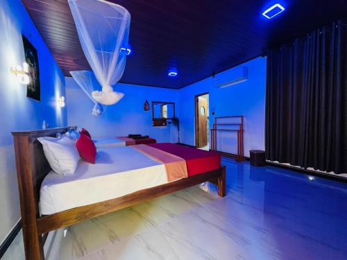 Postel nebo postele na pokoji v ubytování Sigiriya Moonlight Home