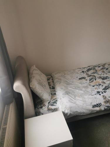 Una cama o camas en una habitación de FFSGL3