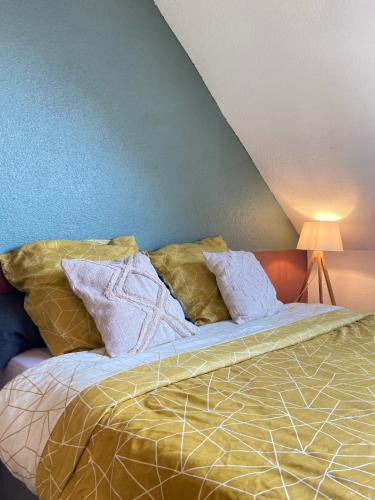 Ένα ή περισσότερα κρεβάτια σε δωμάτιο στο Bel appartement 2 pièces