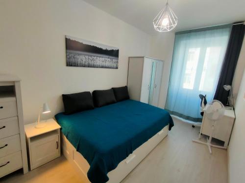 Кровать или кровати в номере Trieste LIVING