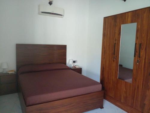 Postel nebo postele na pokoji v ubytování Villa Dario