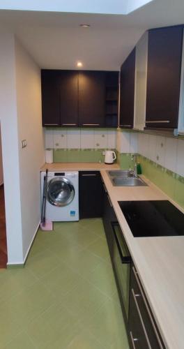 Kuchyň nebo kuchyňský kout v ubytování Apartamenty Jagiełło