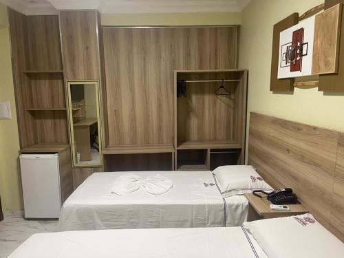 Posteľ alebo postele v izbe v ubytovaní Hotel Campos