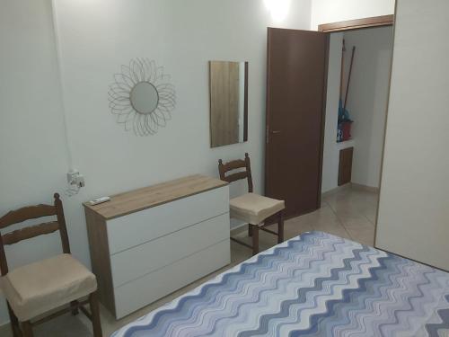 Postel nebo postele na pokoji v ubytování Casa vacanza Marta