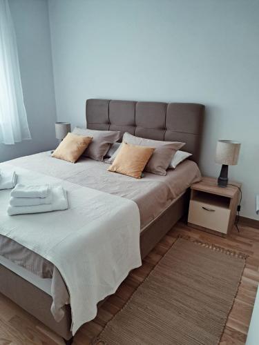 Ένα ή περισσότερα κρεβάτια σε δωμάτιο στο Apartman West Zen