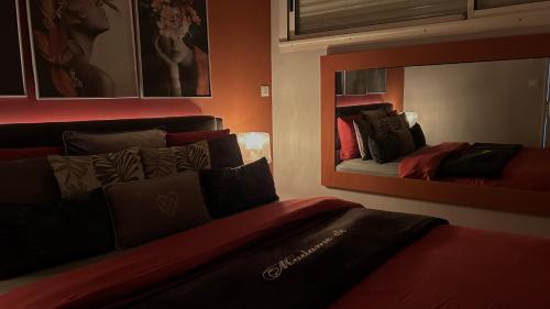 Ένα ή περισσότερα κρεβάτια σε δωμάτιο στο Bienvenue chez Maxime