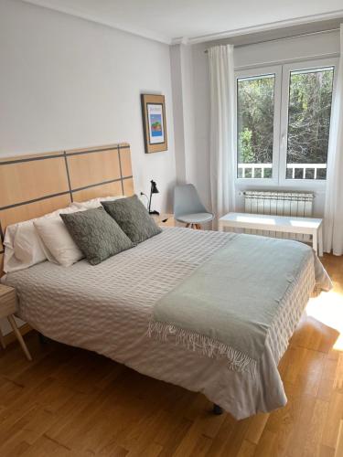 Ένα ή περισσότερα κρεβάτια σε δωμάτιο στο sands apartments