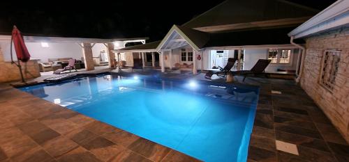 Afbeelding uit fotogalerij van Villa JADE, VUE MER, PISCINE PRIVEE, PLAGE A PIEDS in Le Gosier