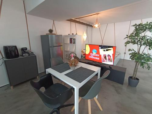 TV a/nebo společenská místnost v ubytování Taliarte Suite Vibbecanarias