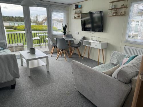 Televisyen dan/atau pusat hiburan di Cleethorpes beach haven site