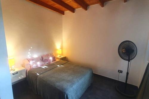 En eller flere senge i et værelse på El depa de Nico