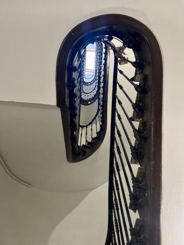 a mirror on a wall with a tennis racket at L'élégant - Capitole in Toulouse